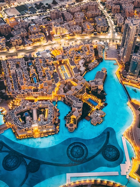 Panoramic view of Dubai cityscape from Burj Khalifa's Levels 124 and 125.