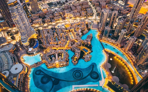 Panoramic view of Dubai cityscape from Burj Khalifa's Levels 124 and 125.
