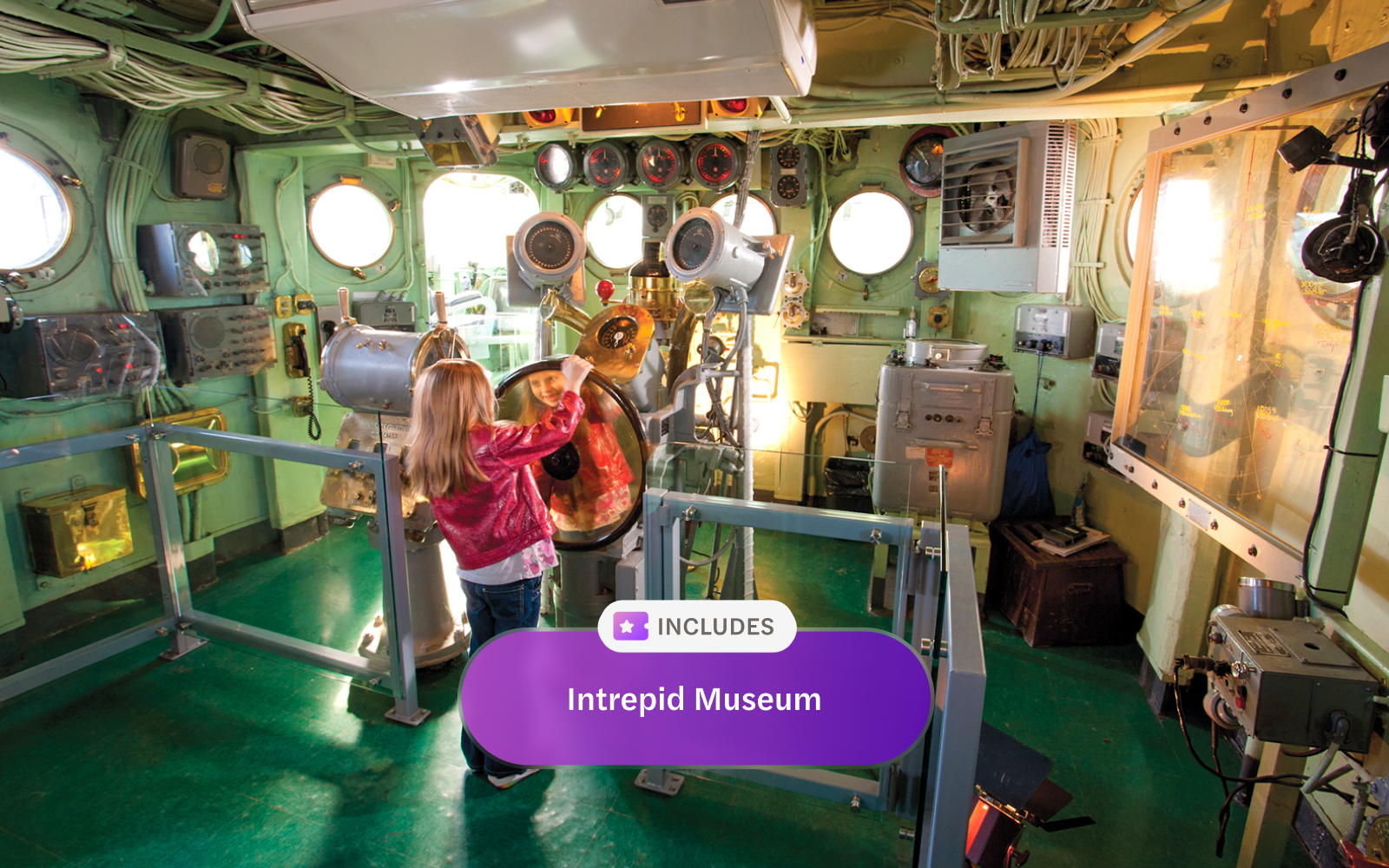 Child exploring the control room at Intrepid Museum, New York City.