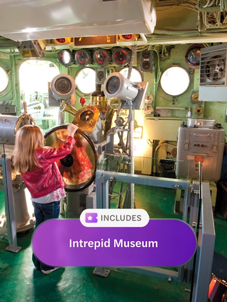 Child exploring the control room at Intrepid Museum, New York City.