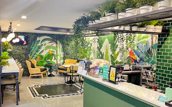 Forest-themed seating area at The Coral Executive Lounge, Bangkok Airport, Thailand.