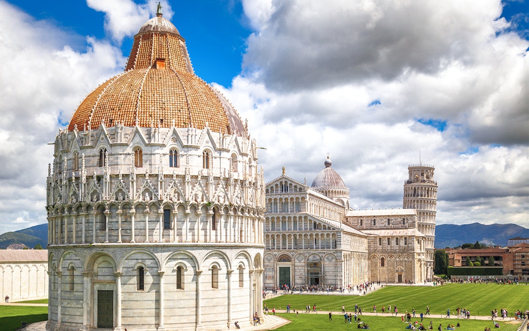 Baptistery and Cathedral at Pisa Monumental Complex, Italy.