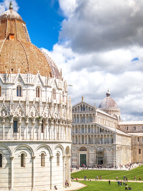Baptistery and Cathedral at Pisa Monumental Complex, Italy.