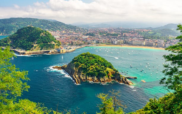 San Sebastian coastline with La Concha Bay and Santa Clara Island.
