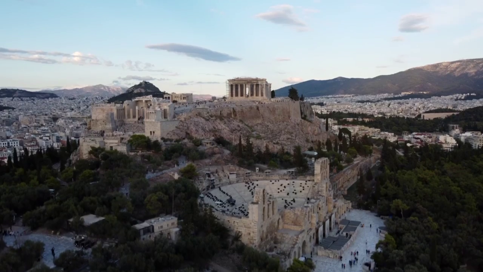 Gondolas on a canal in Venice City with historic buildings in the background.