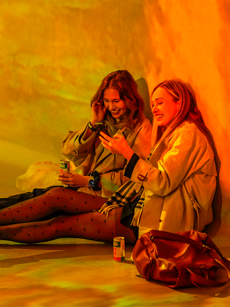 Visitors enjoying interactive exhibit at Frameless Lates event.