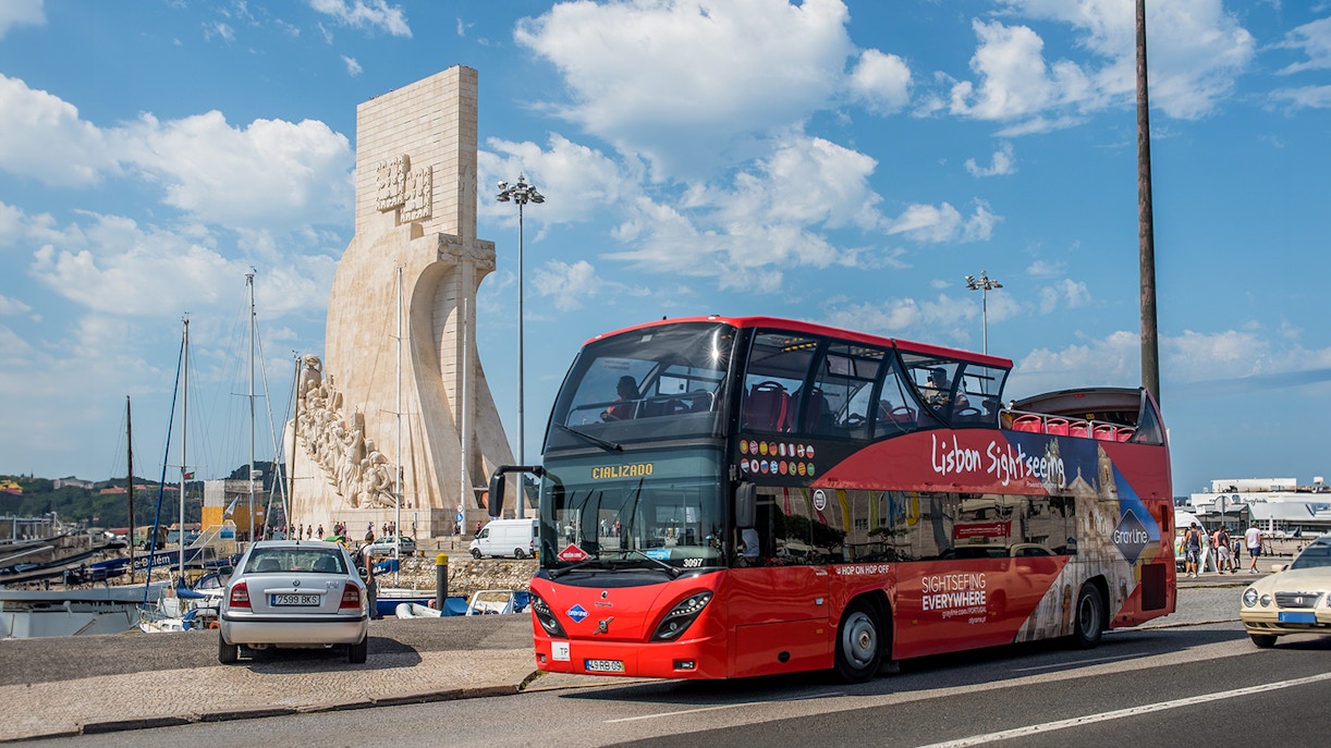 Lisbon Cityrama HOHO tour bus near Monument of Discoveries.