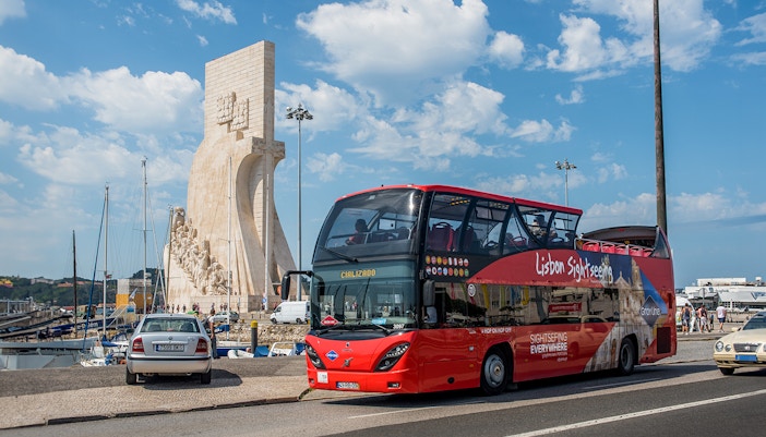 Lisbon Cityrama HOHO tour bus near Monument of Discoveries.