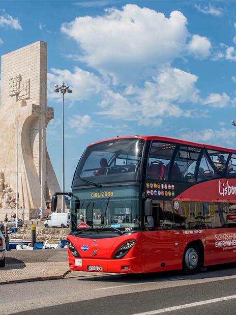 Lisbon Cityrama HOHO tour bus near Monument of Discoveries.