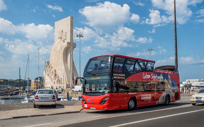 Lisbon Cityrama HOHO tour bus near Monument of Discoveries.