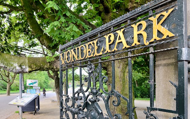 Vondelpark entrance gate in Amsterdam, part of a self-guided walking tour.
