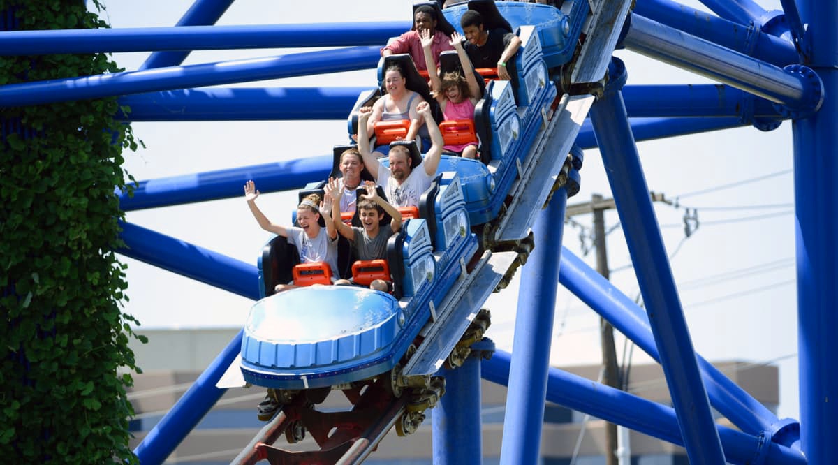 Visitors enjoying the MR. FREEZE™ roller coaster at Six Flags Over Texas.