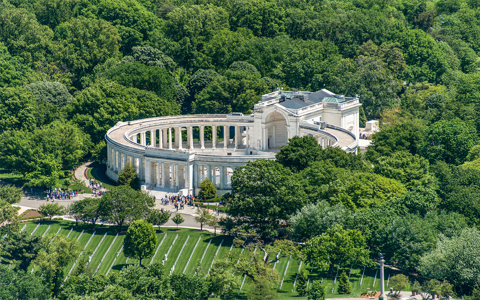 Aerial view of Arlington National Cemetery Memorial amphitheater surrounded by trees in Washington, D.C.