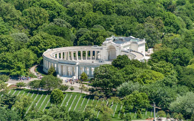 Aerial view of Arlington National Cemetery Memorial amphitheater surrounded by trees in Washington, D.C.