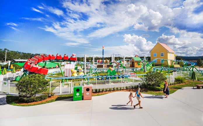 Roller coaster at Peppa Pig Park in Guntzburg with colorful rides and family attractions.