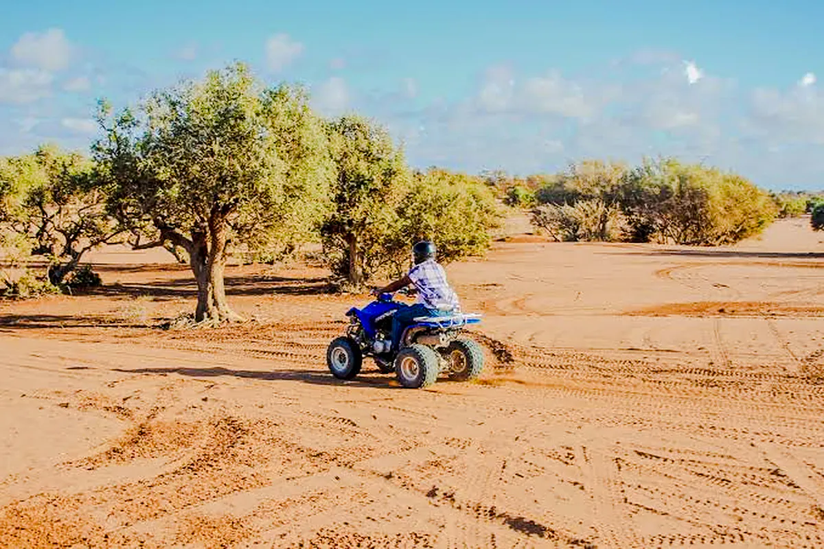Quad biking through desert landscape near Agadir.