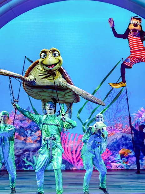 Live performance with sea creature puppets at Disney Adventure Cruise.