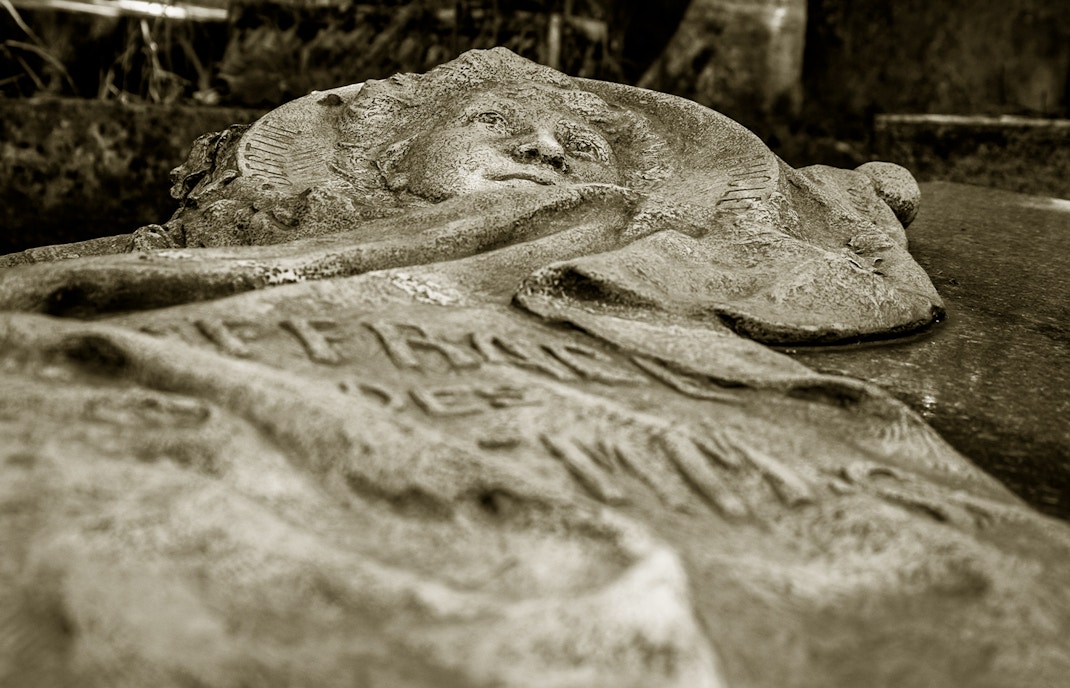 Notre Dame Paris crypts and tombs with historical artifacts and ancient stone architecture.