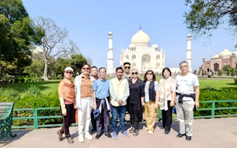 Tour group in front of the Taj Mahal during a private sunrise tour in Agra, India.