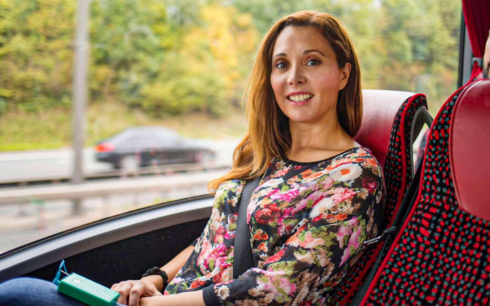 Visitor on a bus heading to Warwick Castle.