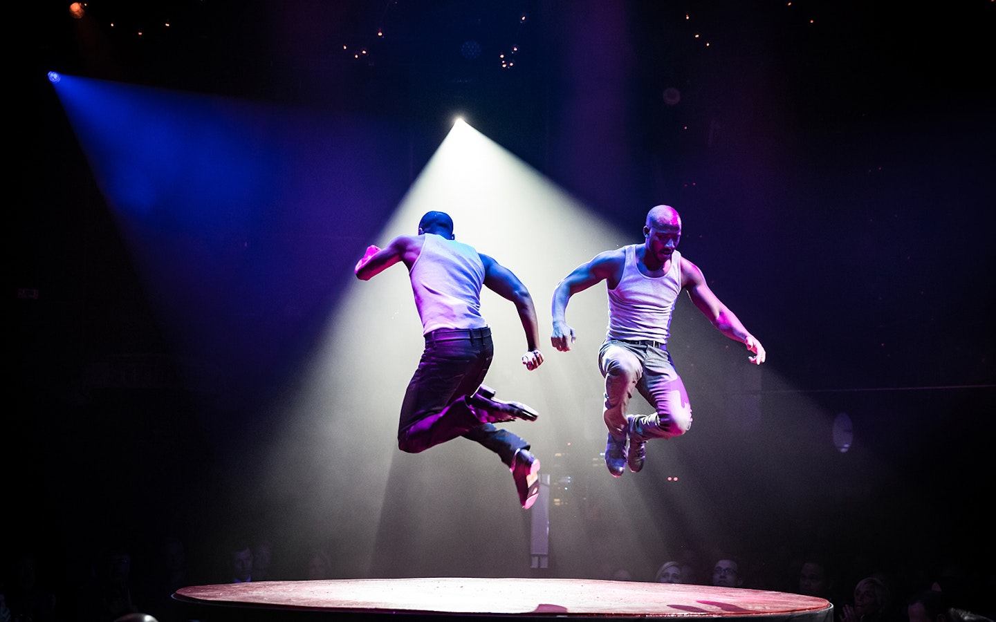 Performers jumping on stage during Absinthe show in Las Vegas.