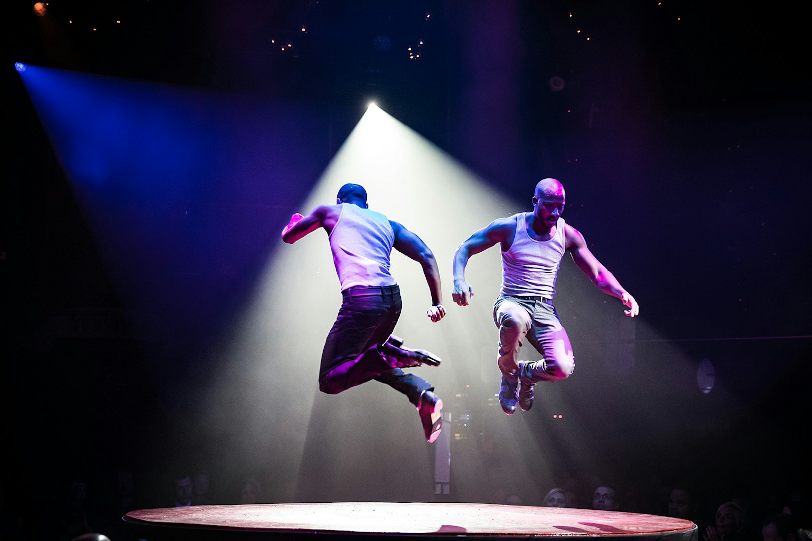 Performers jumping on stage during Absinthe show in Las Vegas.