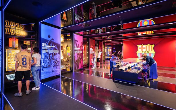 Visitors exploring FC Barcelona museum exhibits during Christmas Total Xperience.