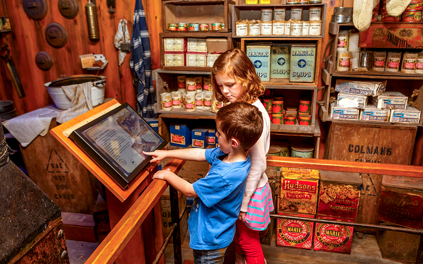 Children exploring interactive display at SEA LIFE Kelly Tarlton's Aquarium.