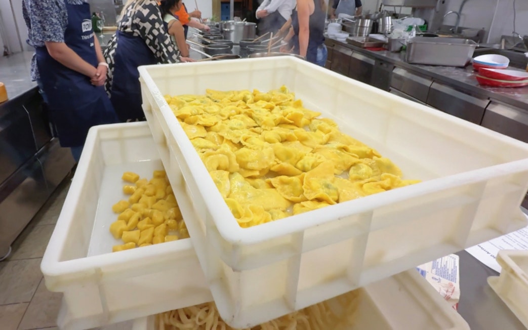 Fresh pasta drying during a cooking class in Siena kitchen.