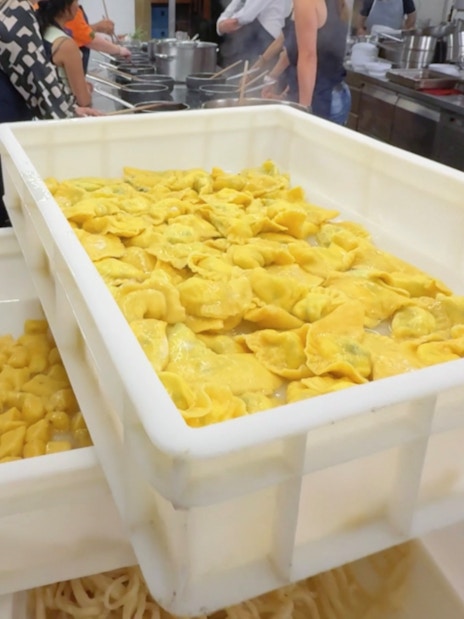 Fresh pasta drying during a cooking class in Siena kitchen.