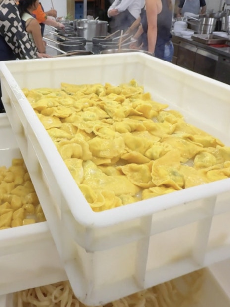 Fresh pasta drying during a cooking class in Siena kitchen.
