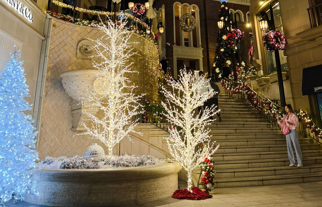 Festive Christmas lights and decorations on stairs at the Grove, Los Angeles.