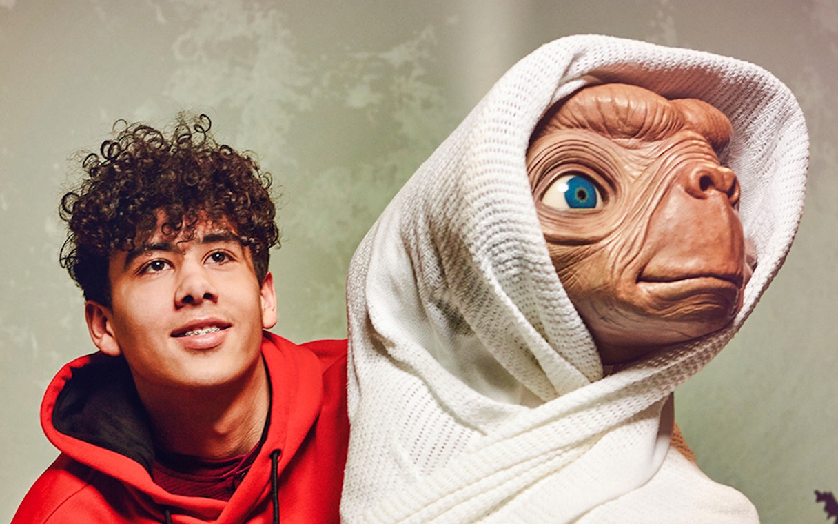 Young person with E.T. figure at Madame Tussauds London.