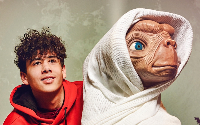 Young person with E.T. figure at Madame Tussauds London.