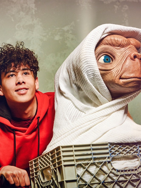 Young person with E.T. figure at Madame Tussauds London.