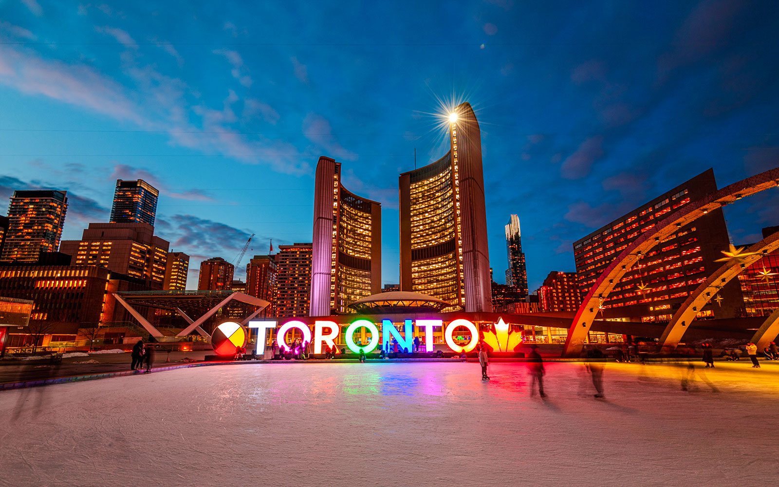 Toronto City Hall and illuminated sign at night, Ontario, Canada.