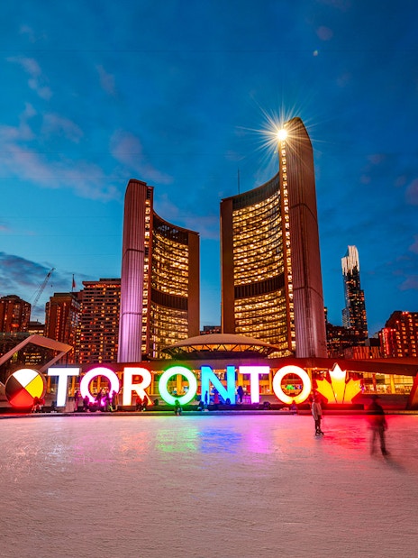 Toronto City Hall and illuminated sign at night, Ontario, Canada.