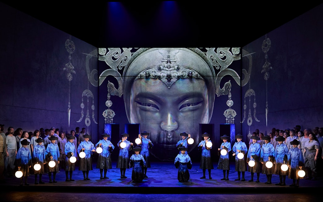 Stage performance of Turandot in Sydney with performers holding lanterns.