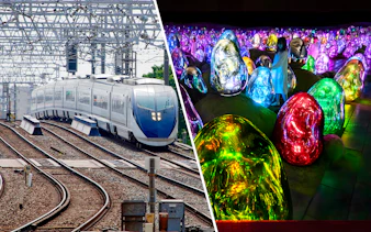 Skyliner Narita Express train on tracks and colorful digital art at teamLab Planets Tokyo.