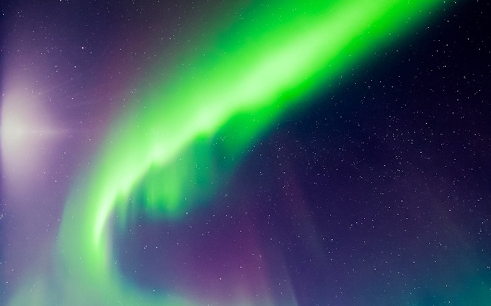 Northern lights illuminating the night sky in Levi, Finland.