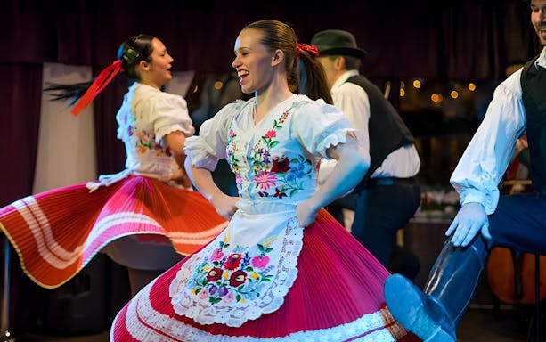 Folklore dancers performing on Budapest dinner cruise.