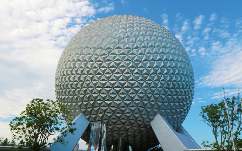 Spaceship Earth at EPCOT, Walt Disney World, Orlando, under a blue sky.