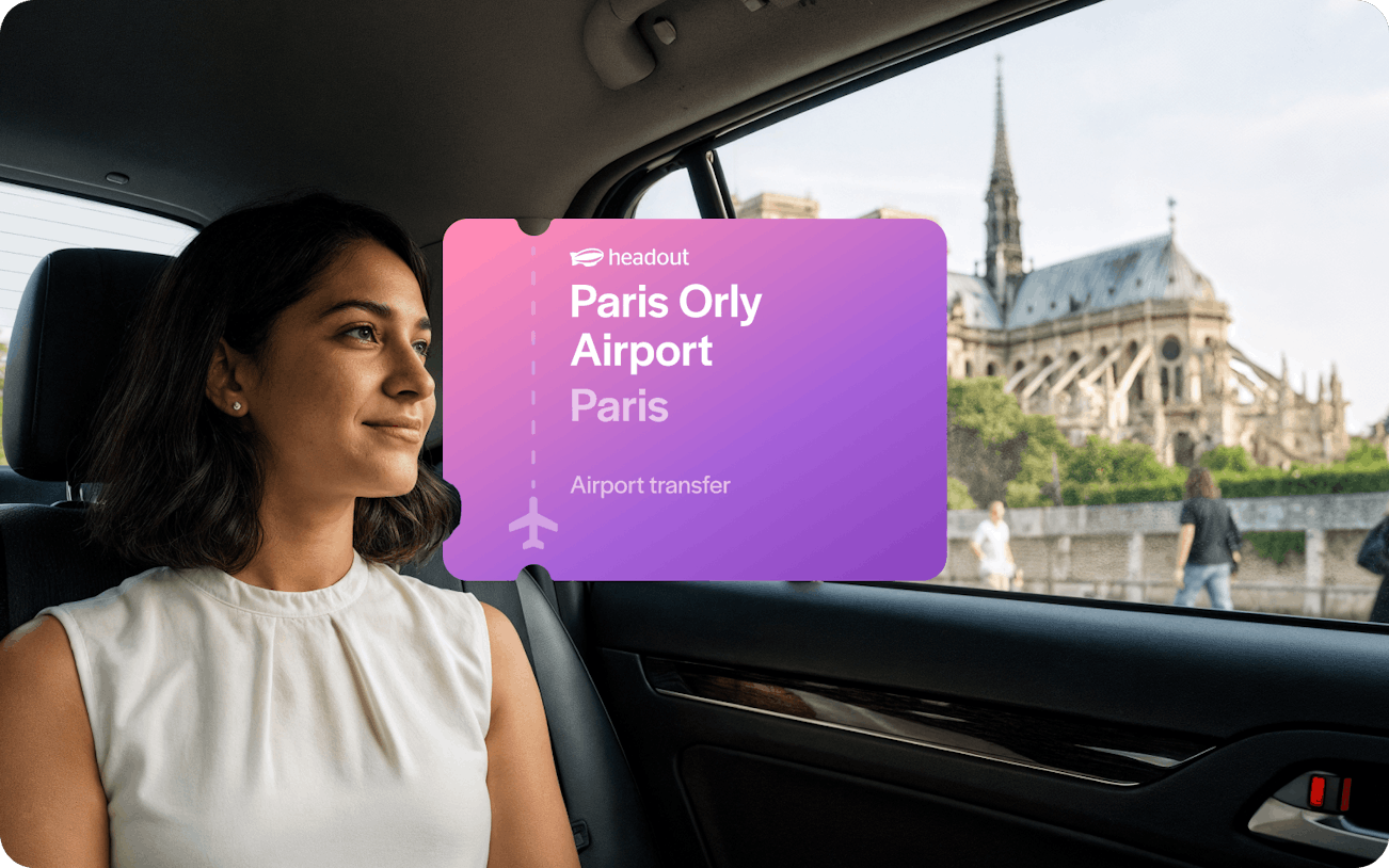 Private car transfer from Paris-Orly Airport with view of Notre-Dame Cathedral.