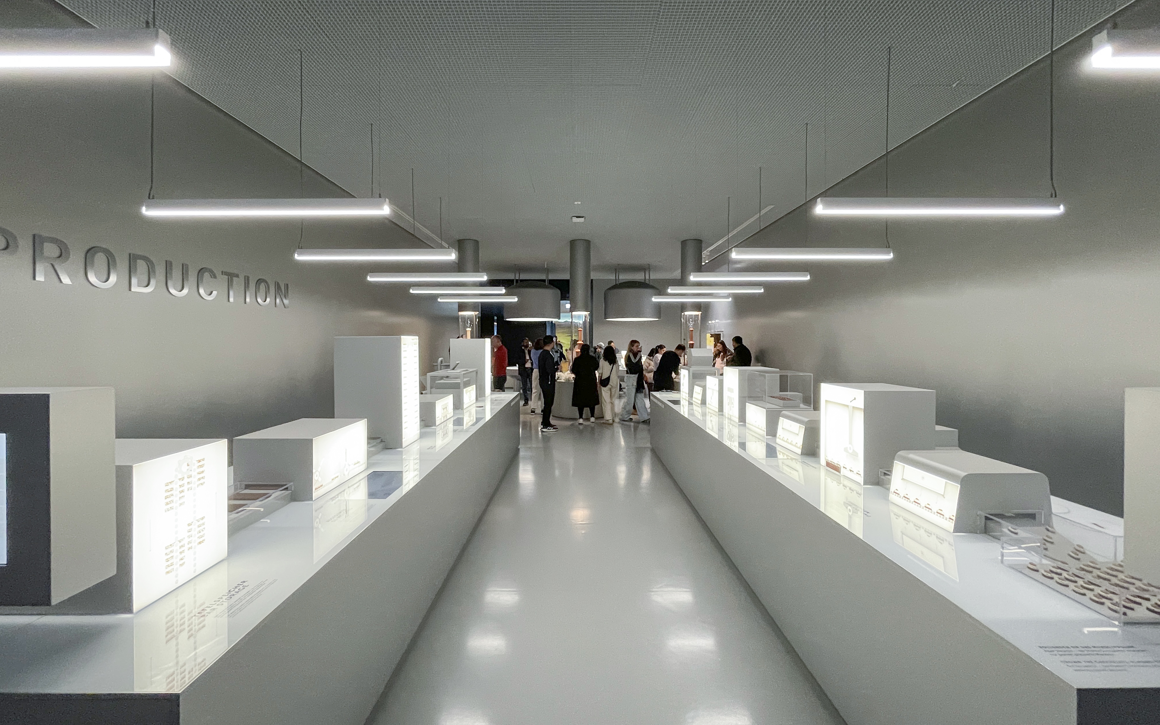 Visitors exploring exhibits at Lindt Home of Chocolate Museum in Zurich.