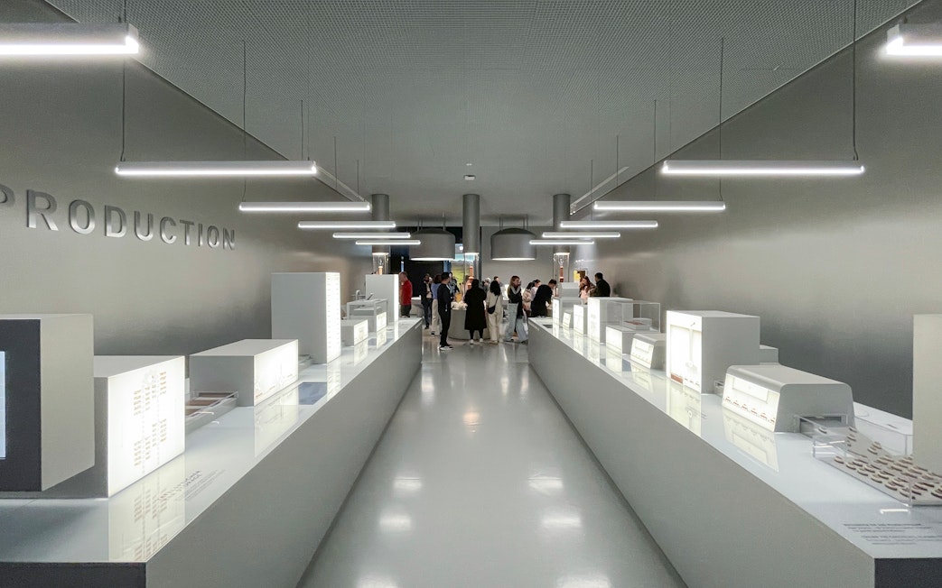 Visitors exploring exhibits at Lindt Home of Chocolate Museum in Zurich.