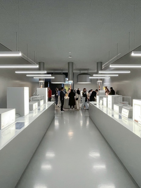 Visitors exploring exhibits at Lindt Home of Chocolate Museum in Zurich.