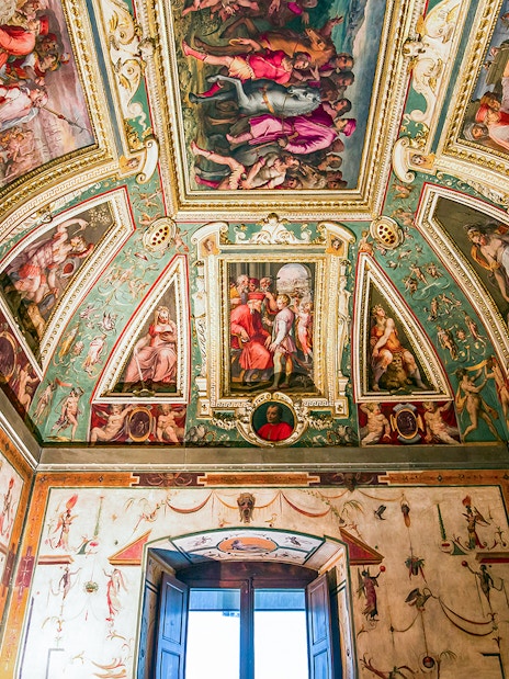 Palazzo Vecchio ornate ceiling and frescoes in Florence, Italy.