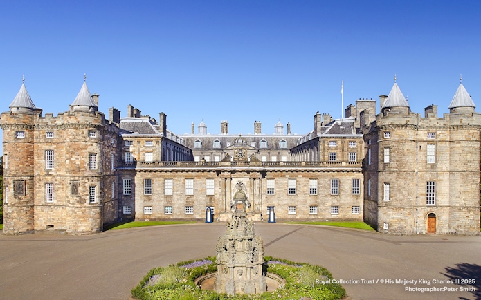 Palace of Holyroodhouse exterior with central fountain, Edinburgh, Scotland.