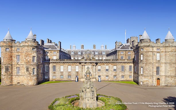 Palace of Holyroodhouse exterior with central fountain, Edinburgh, Scotland.