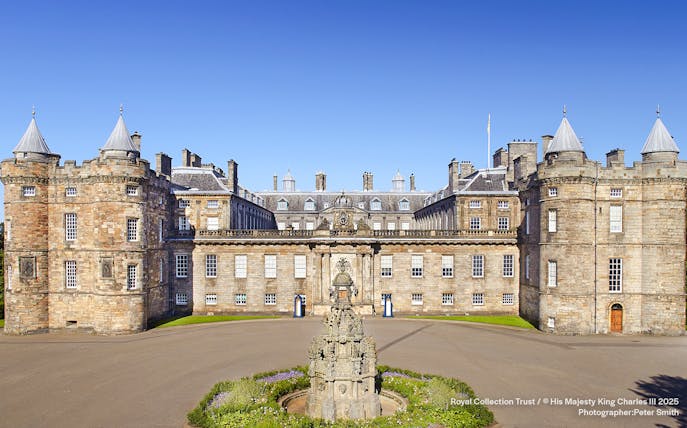 Palace of Holyroodhouse exterior with central fountain, Edinburgh, Scotland.